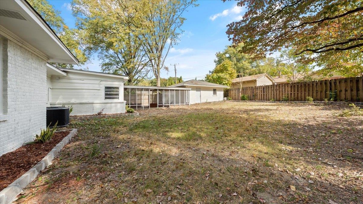 176 North Rose Road Memphis, TN 38117 - Photo 21 of 24 a view of a house with a yard