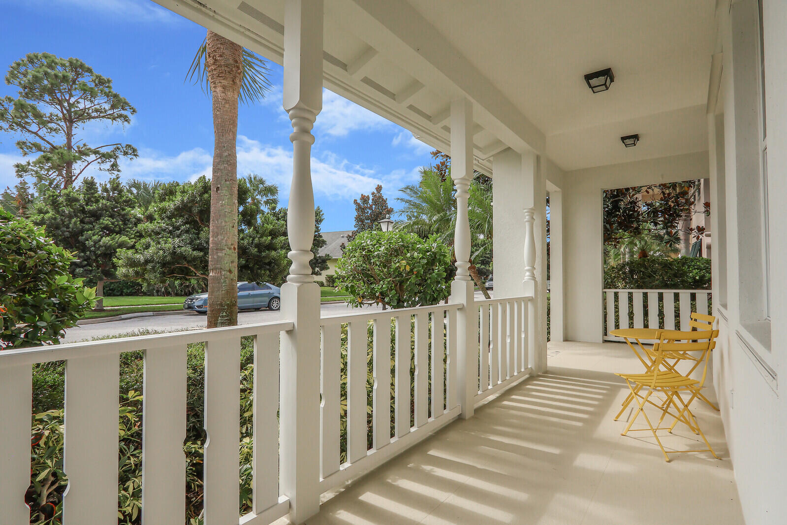 101 St Pierre Way Jupiter, FL 33458 - Photo 4 of 57 a view of a balcony with wooden floor