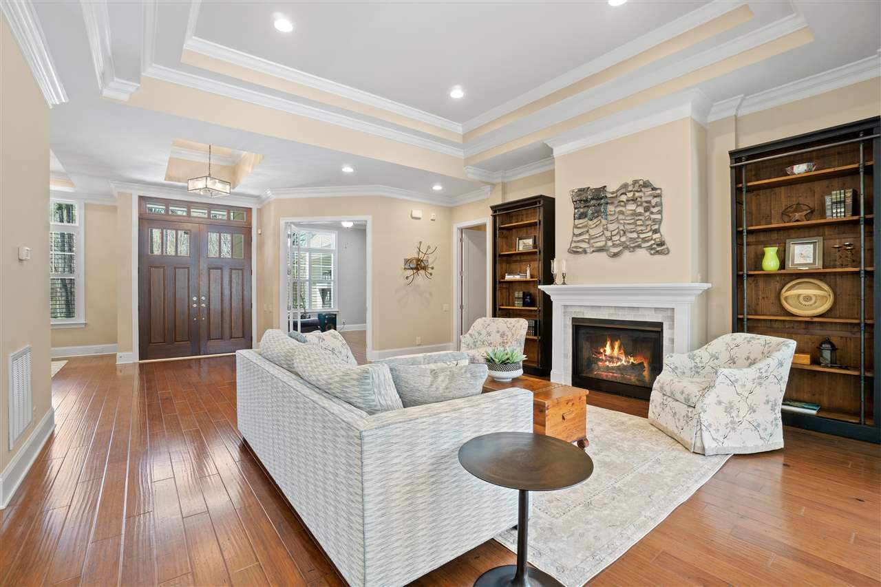 1504 Brassfield Road Raleigh, NC 27614 - Photo 9 of 30 Living Room with Gas Fireplace and Tray Ceiling