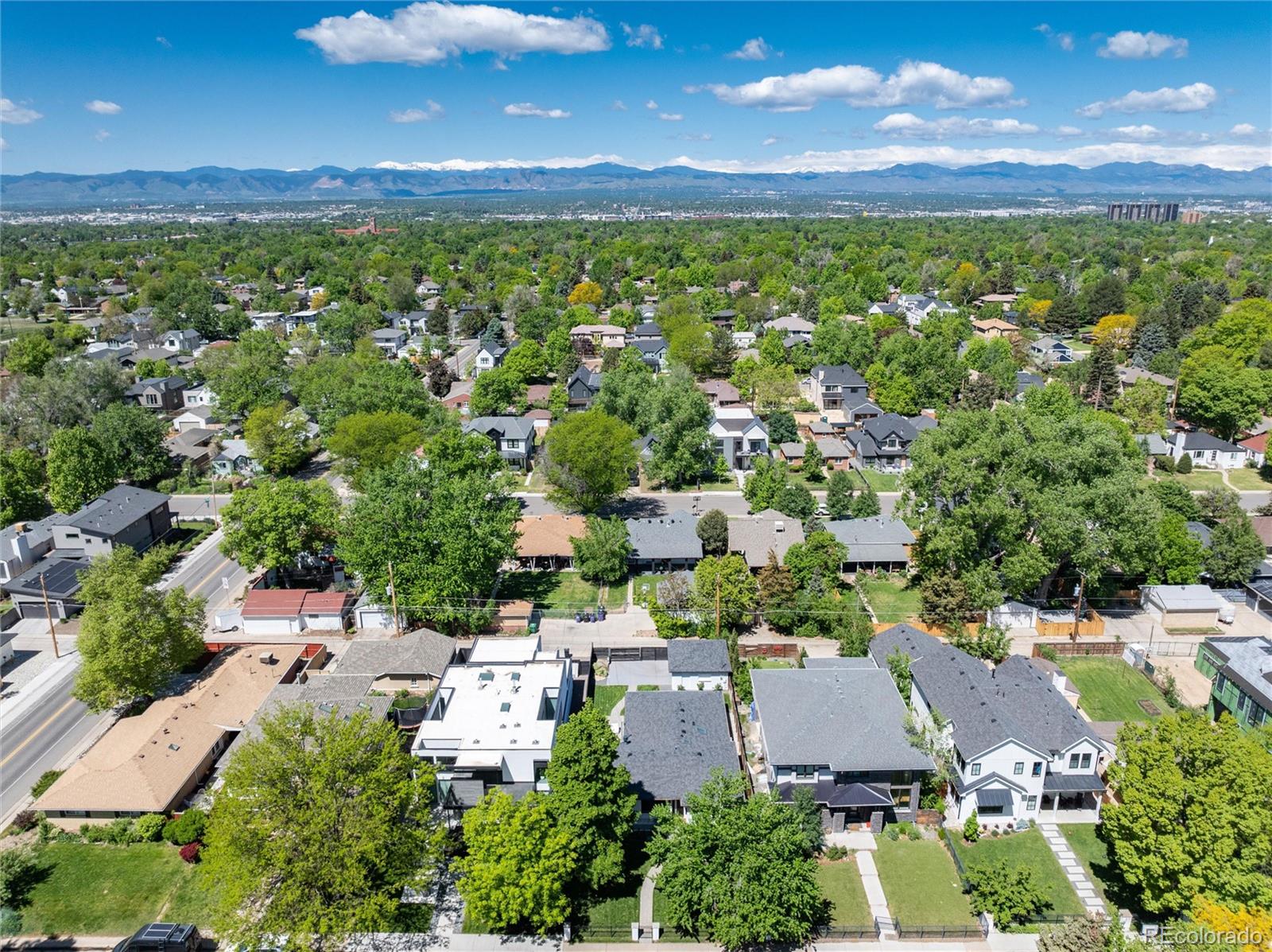1065 South Monroe Street Denver, CO 80209 - Photo 30 of 32 an aerial view of residential houses with outdoor space and trees