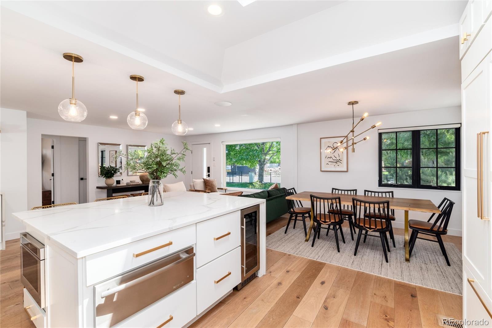 1065 South Monroe Street Denver, CO 80209 - Photo 7 of 32 a view of a dining room with furniture window and outside view