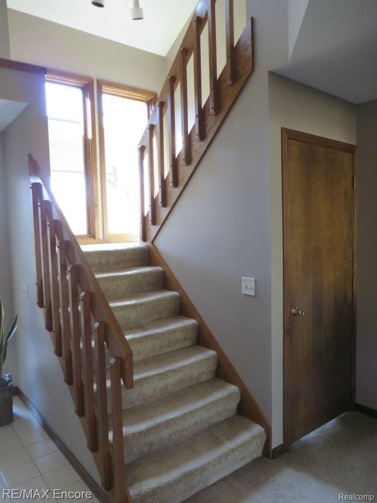 1015 Enfield Road Rochester, MI 48307 - Photo 20 of 32 Sunlit Staircase Leading To Second Floor