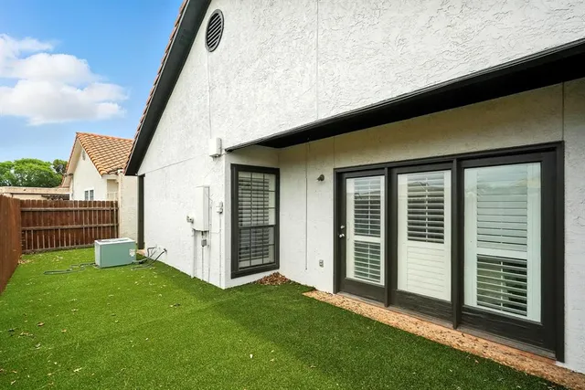 a view of a porch with a backyard