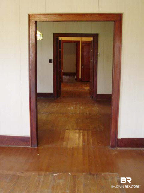 34205 West Barclay Avenue Lillian, AL 36549 - Photo 9 of 46 LR to DR and hallway