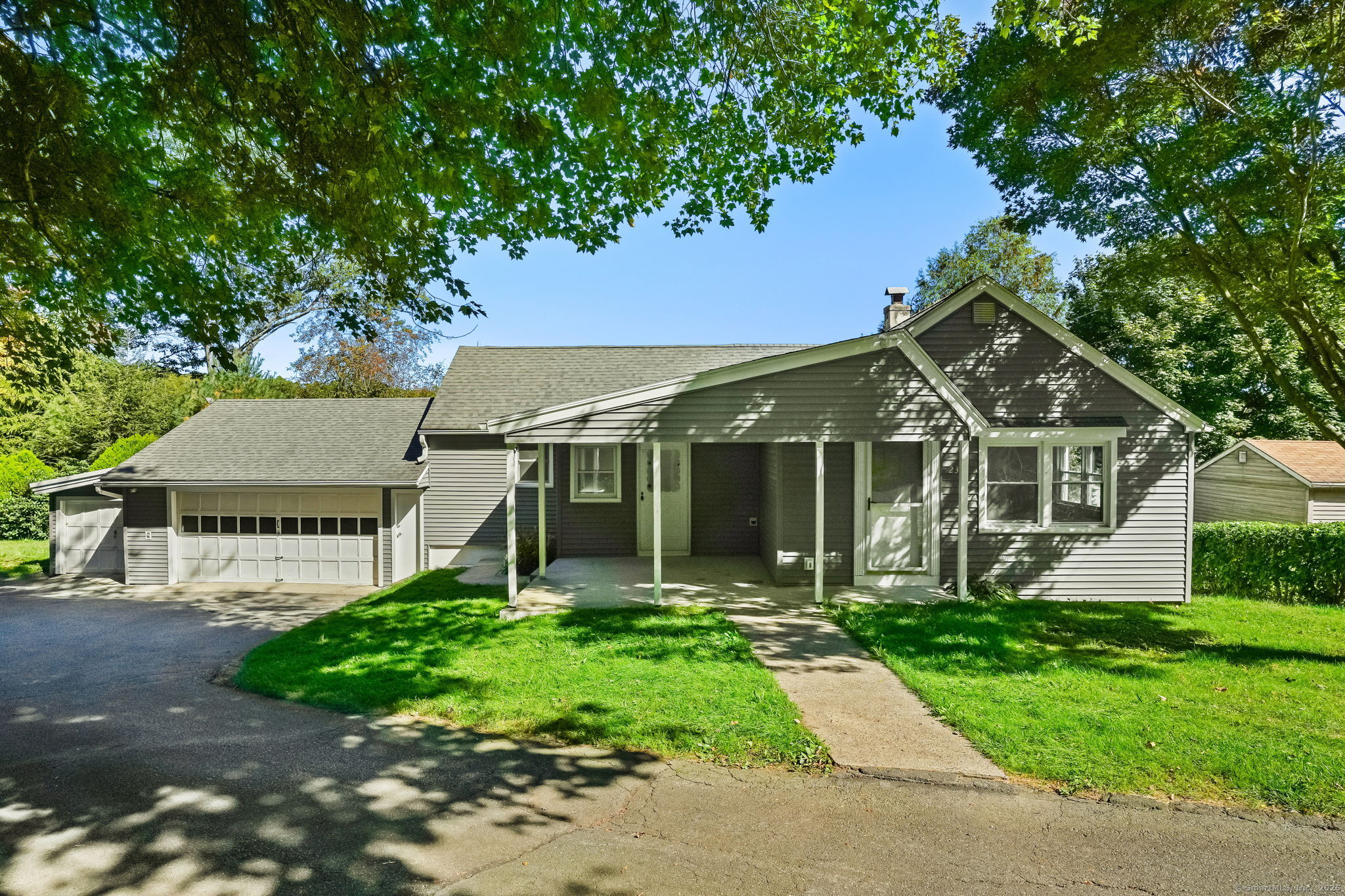 front view of a house with a yard