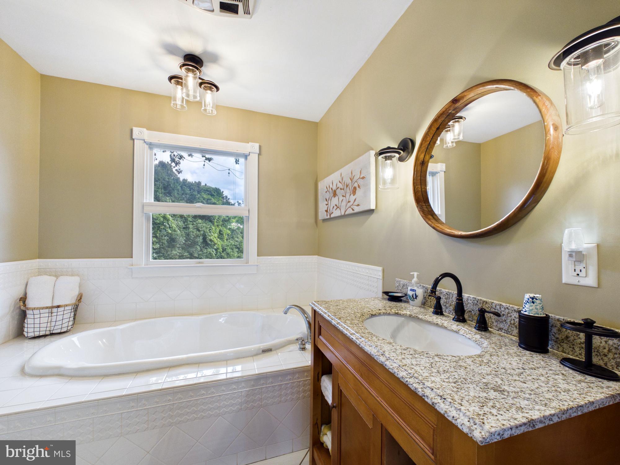 26285 Broadkill Road Milton, DE 19968 - Photo 21 of 98 Milton Room's Bath with Soaking Tub & Vanity
