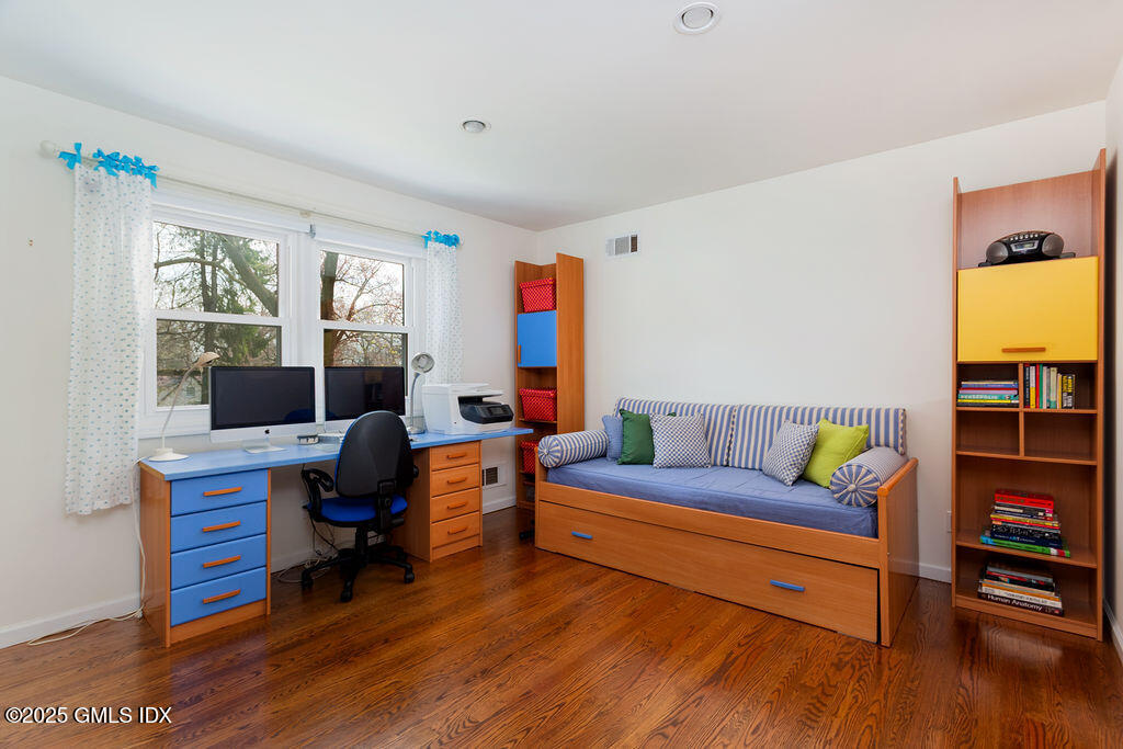 19 Stanwich Road Greenwich, CT 06830 - Photo 13 of 32 a living room with furniture and a wooden floor