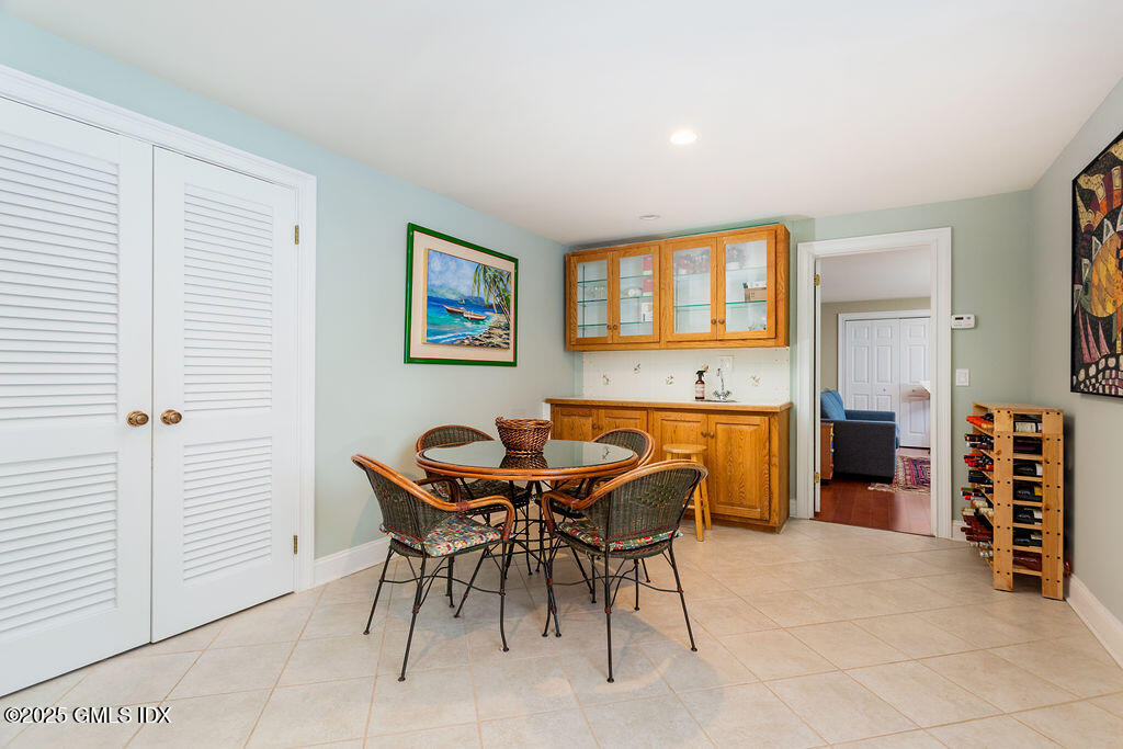 19 Stanwich Road Greenwich, CT 06830 - Photo 21 of 32 a view of a dining room with furniture and chandelier