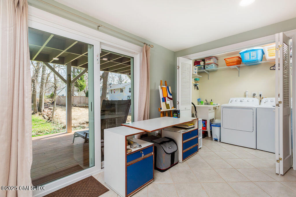 19 Stanwich Road Greenwich, CT 06830 - Photo 22 of 32 a room that has a bed and a window