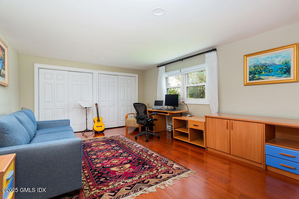 19 Stanwich Road Greenwich, CT 06830 - Photo 23 of 32 a living room with furniture a rug and a window