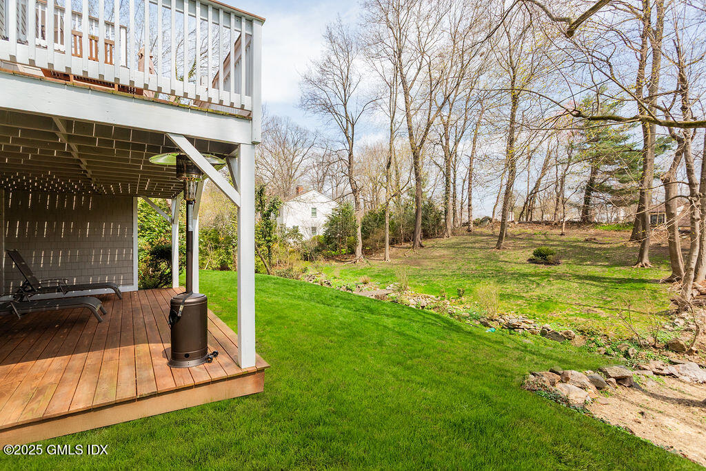 19 Stanwich Road Greenwich, CT 06830 - Photo 27 of 32 a view of swimming pool with lawn chairs and large trees