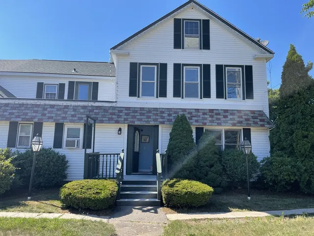 a house view with a garden space