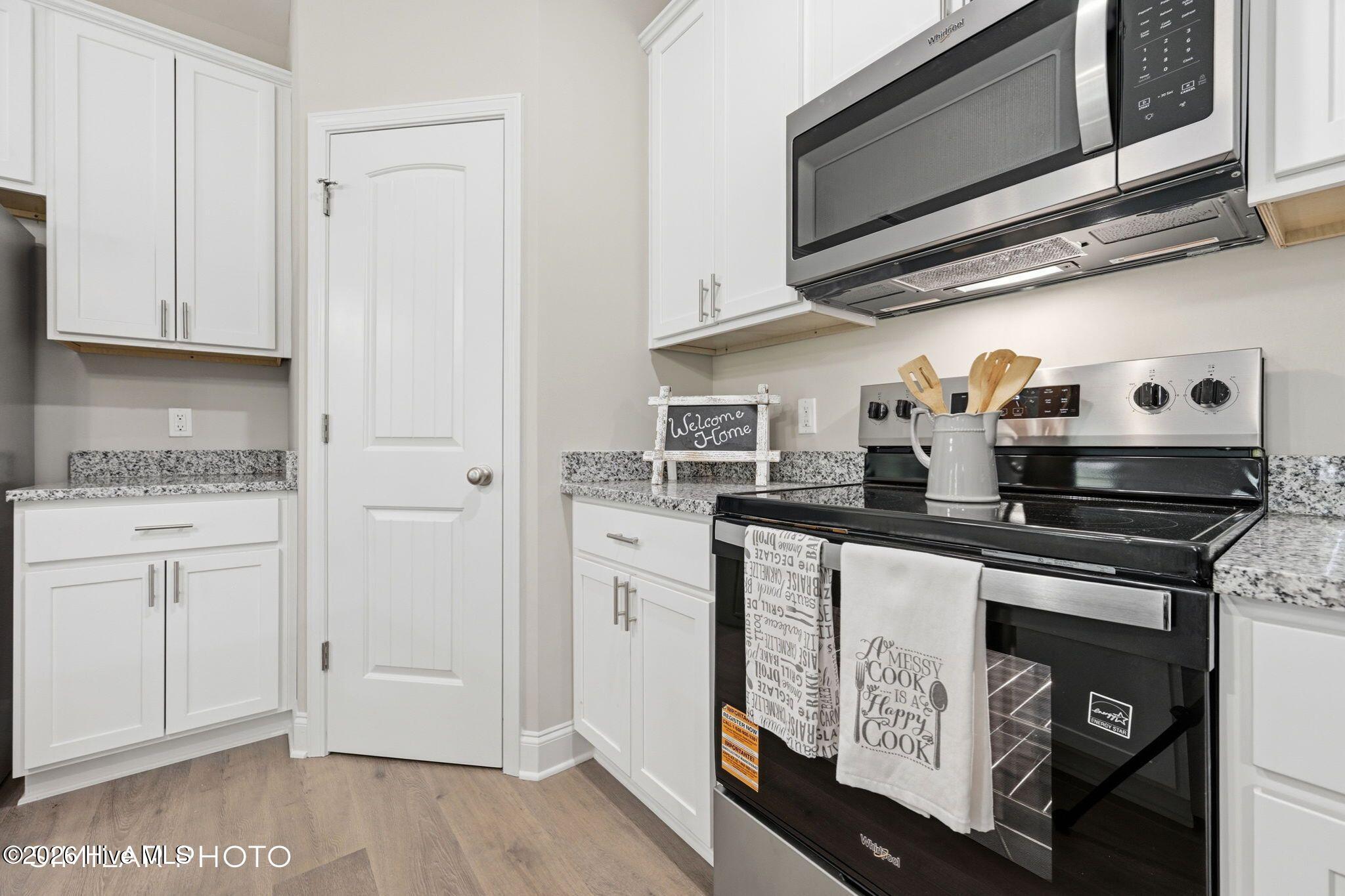 207 Holly Sands Loop Sneads Ferry, NC 28460 - Photo 15 of 45 Similar Photo - Kitchen