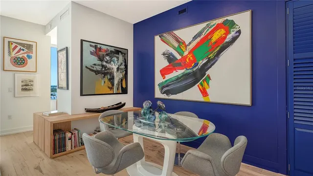 a living room with furniture and flat screen tv