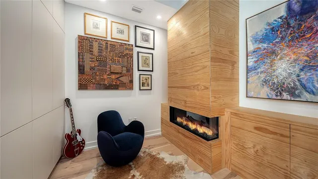 a view of an entryway with wooden floor
