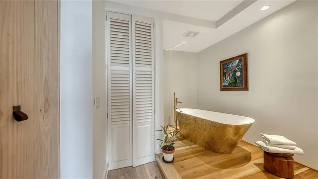 a view of a swimming pool with outdoor seating