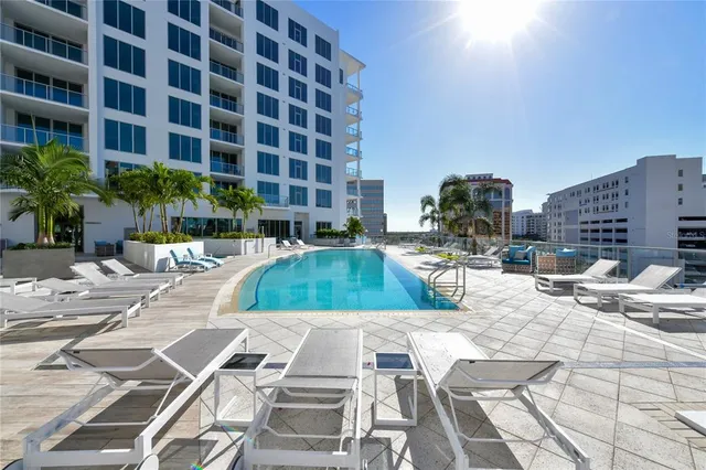 a kitchen with a table and chairs in it