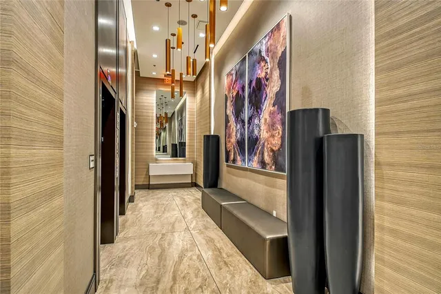 a view of a play room with furniture and toys