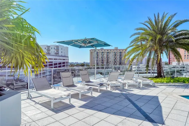 a view of a building with a tree