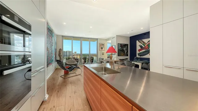 a view of a living room and hardwood floor