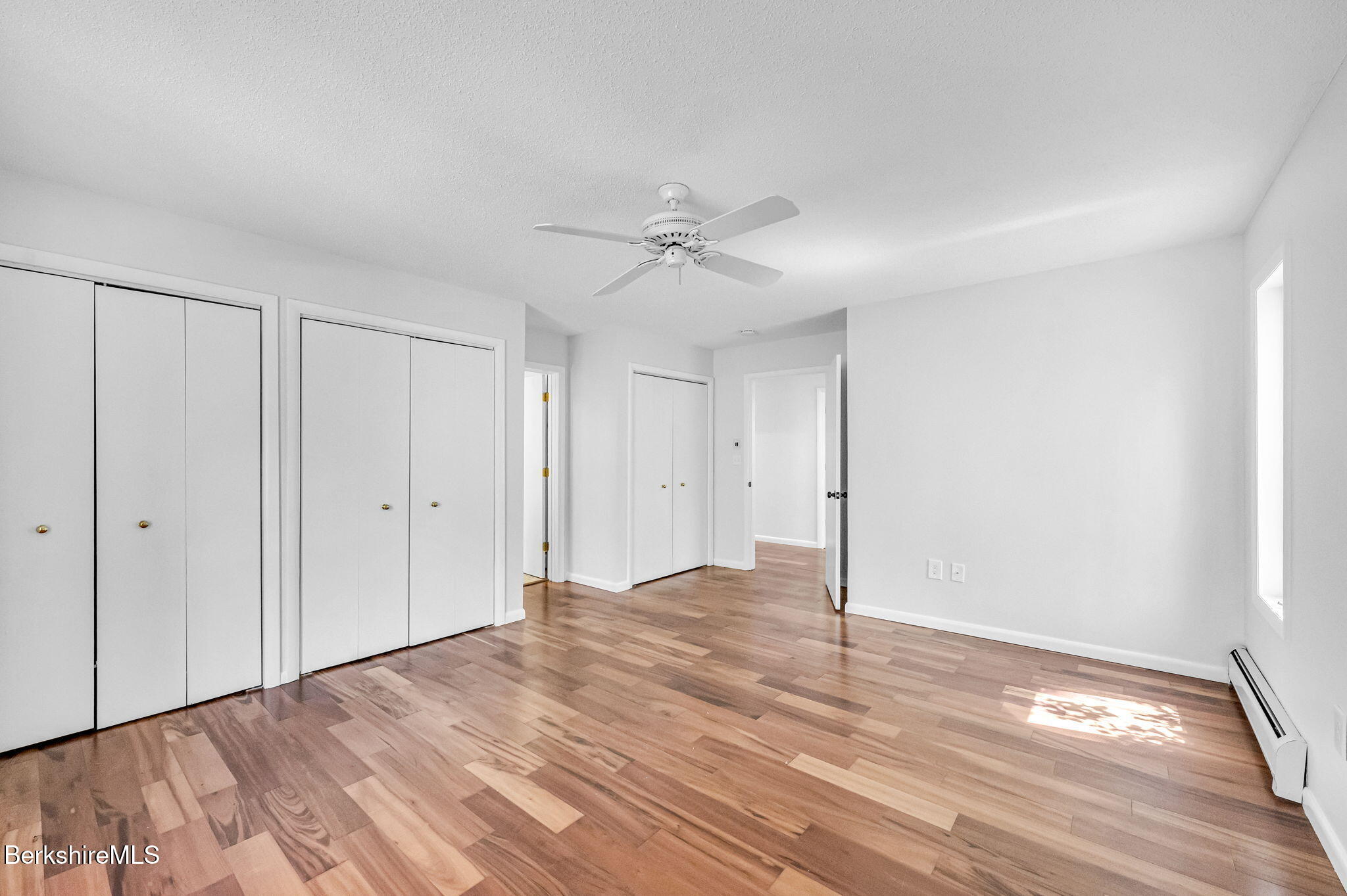 1874 Home Road Sheffield, MA 01230 - Photo 33 of 42 a view of empty room with wooden floor