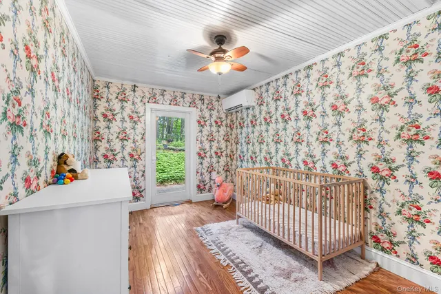 a view of entryway with wooden floor
