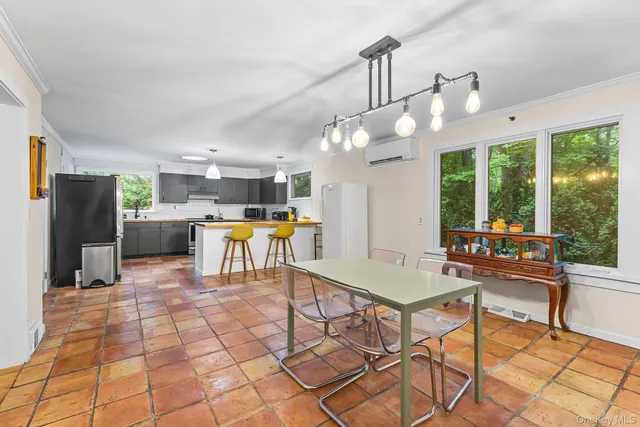 a kitchen with a sink and a stove