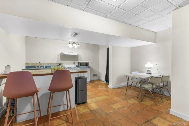 a picture of a bench in front of a window