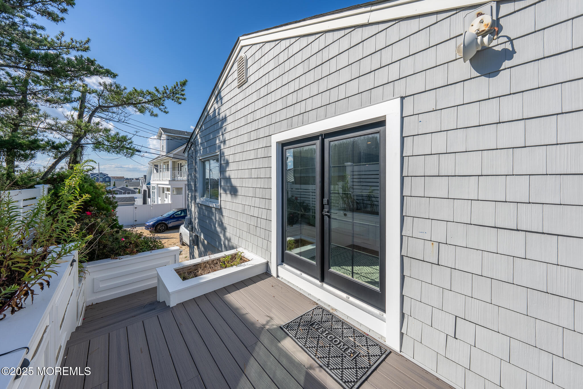 14 Falls Road Mantoloking, NJ 08738 - Photo 23 of 40 a view of sitting area in front of a house