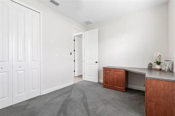 a view of a lake from a balcony