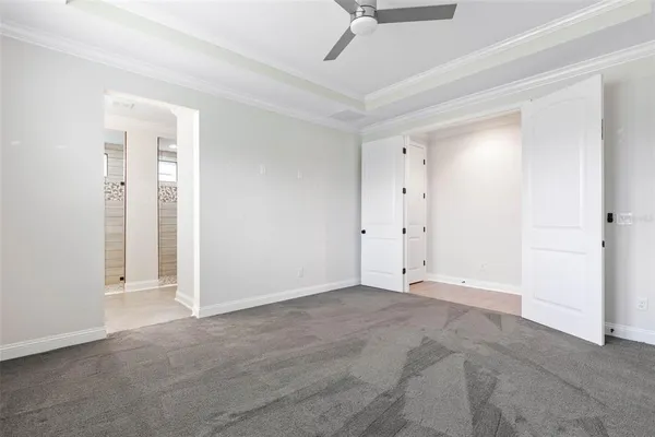 a bathroom with a shower sink and mirror