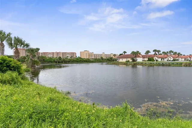 a view of a lake with a beach