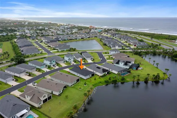 a view of a yard with palm trees