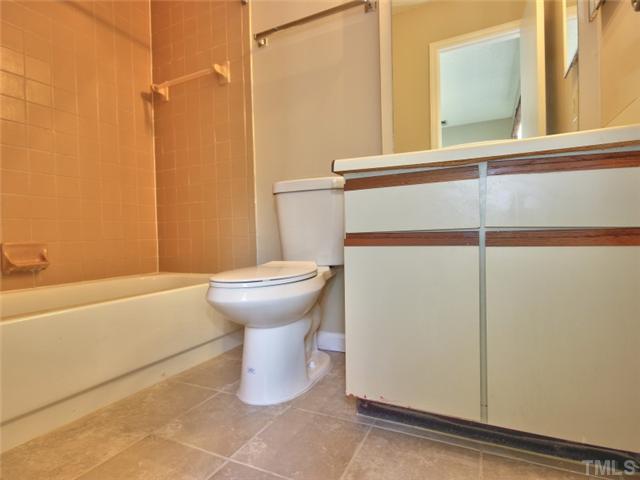 7618 Falcon Rest Circle, Unit 7618 Raleigh, NC 27615 - Photo 19 of 20 a bathroom with a sink and a toilet