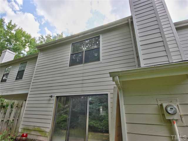 7618 Falcon Rest Circle, Unit 7618 Raleigh, NC 27615 - Photo 20 of 20 a front view of a house with a garage