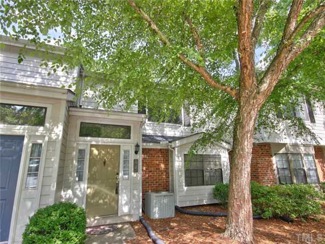 7618 Falcon Rest Circle, Unit 7618 Raleigh, NC 27615 - Photo 2 of 20 a front view of a house with garden