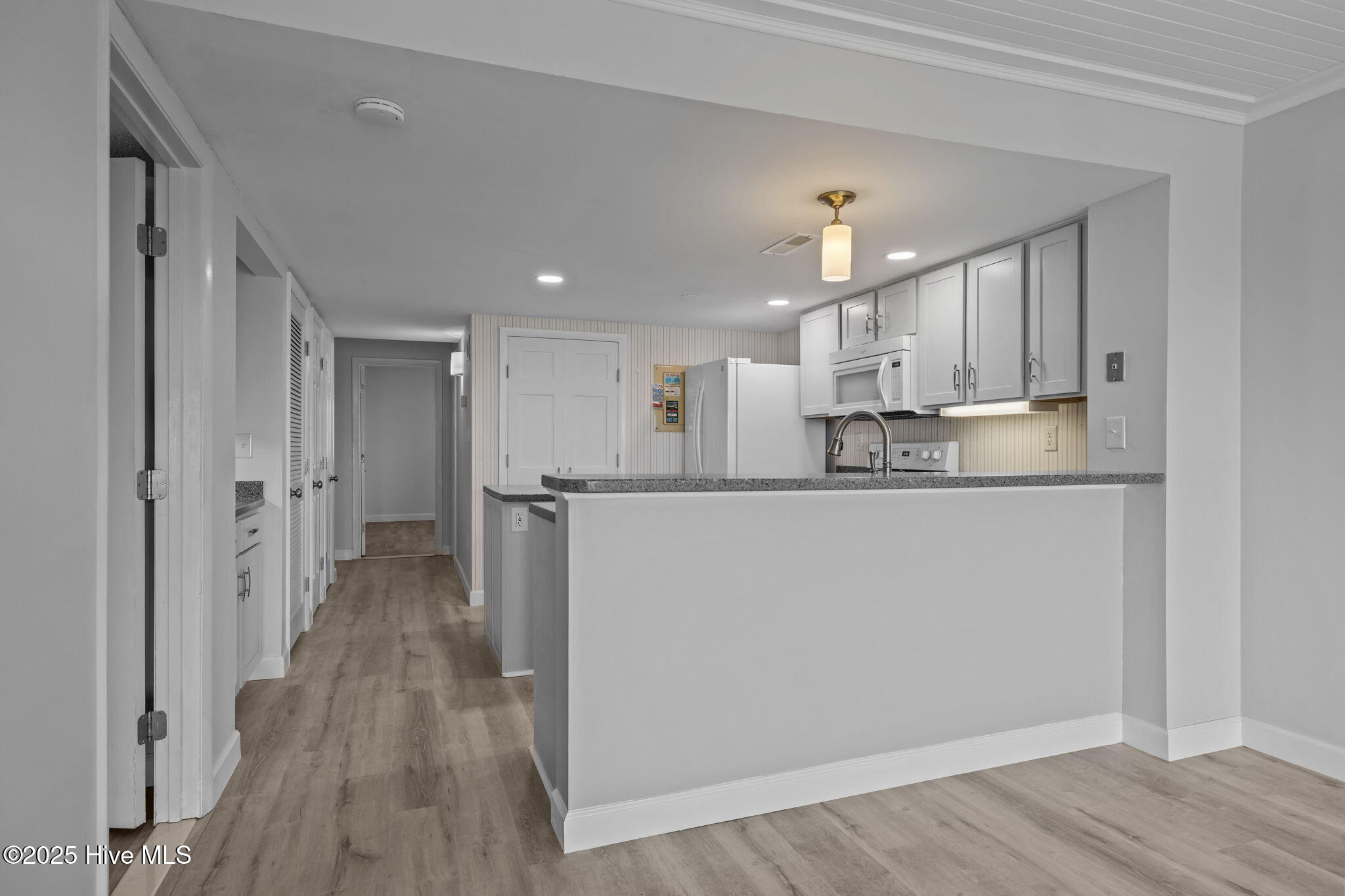 10300 Coast Guard Road, Unit D211 Emerald Isle, NC 28594 - Photo 18 of 54 Dining to Kitchen