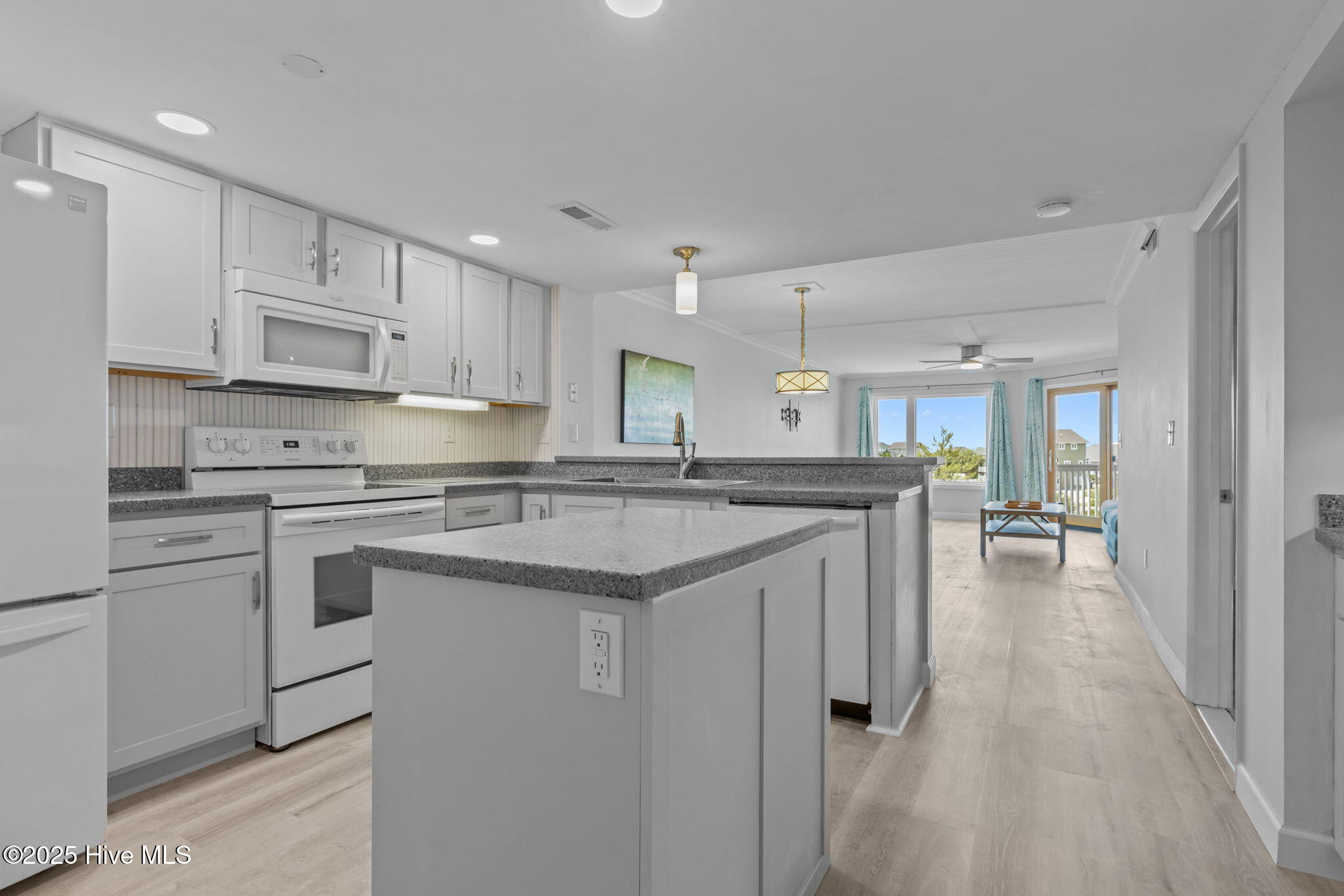 10300 Coast Guard Road, Unit D211 Emerald Isle, NC 28594 - Photo 3 of 54 Kitchen & Living Room