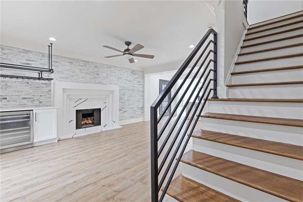 120 Mt Vernon Circle Atlanta, GA 30338 - Photo 15 of 44 a view of an empty room with wooden floor fireplace and a window