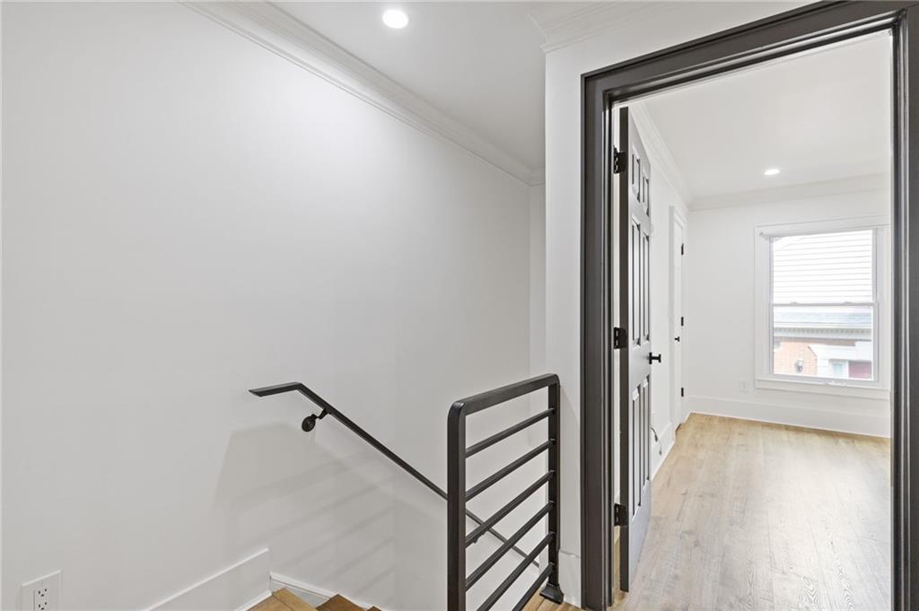 120 Mt Vernon Circle Atlanta, GA 30338 - Photo 16 of 44 a view of a hallway with windows and wooden floor