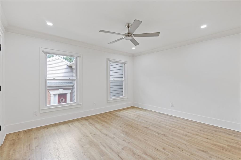 120 Mt Vernon Circle Atlanta, GA 30338 - Photo 17 of 44 wooden floor in an empty room with a window