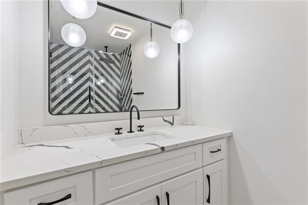 120 Mt Vernon Circle Atlanta, GA 30338 - Photo 20 of 44 a bathroom with a sink and a mirror