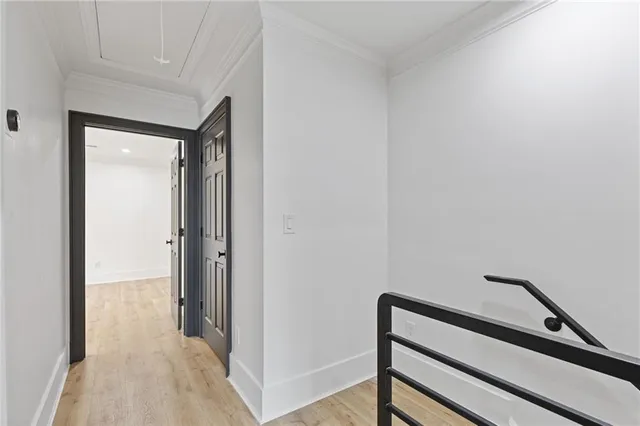 a view of hallway with closet