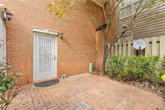 a view of a backyard of the house