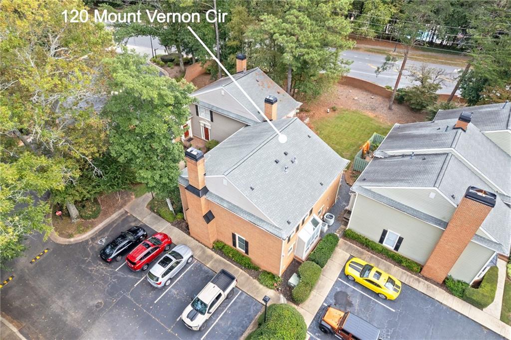 120 Mt Vernon Circle Atlanta, GA 30338 - Photo 34 of 44 an aerial view of residential house with outdoor space and parking