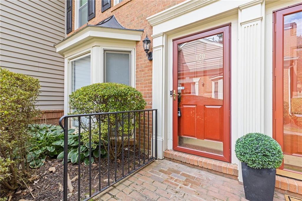 120 Mt Vernon Circle Atlanta, GA 30338 - Photo 5 of 44 a view of a potted plant in front of a house
