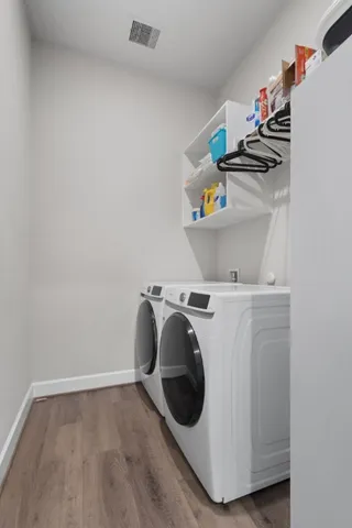 a utility room with dryer and washer