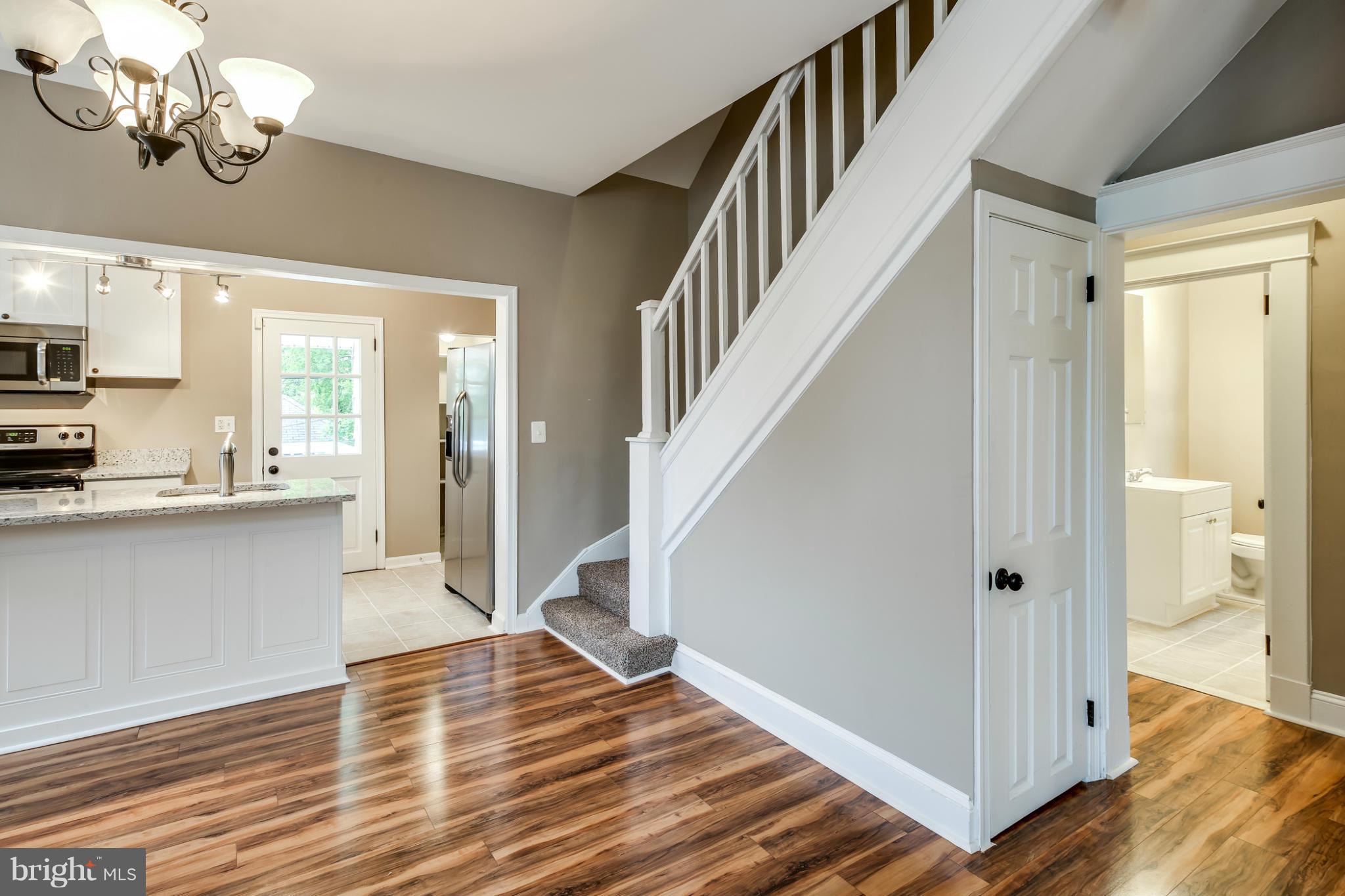 622 North Bend Road Baltimore, MD 21229 - Photo 5 of 30 Dining Room and Staircase