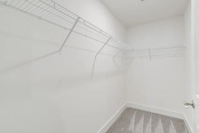 a view of a room with racks on the wall