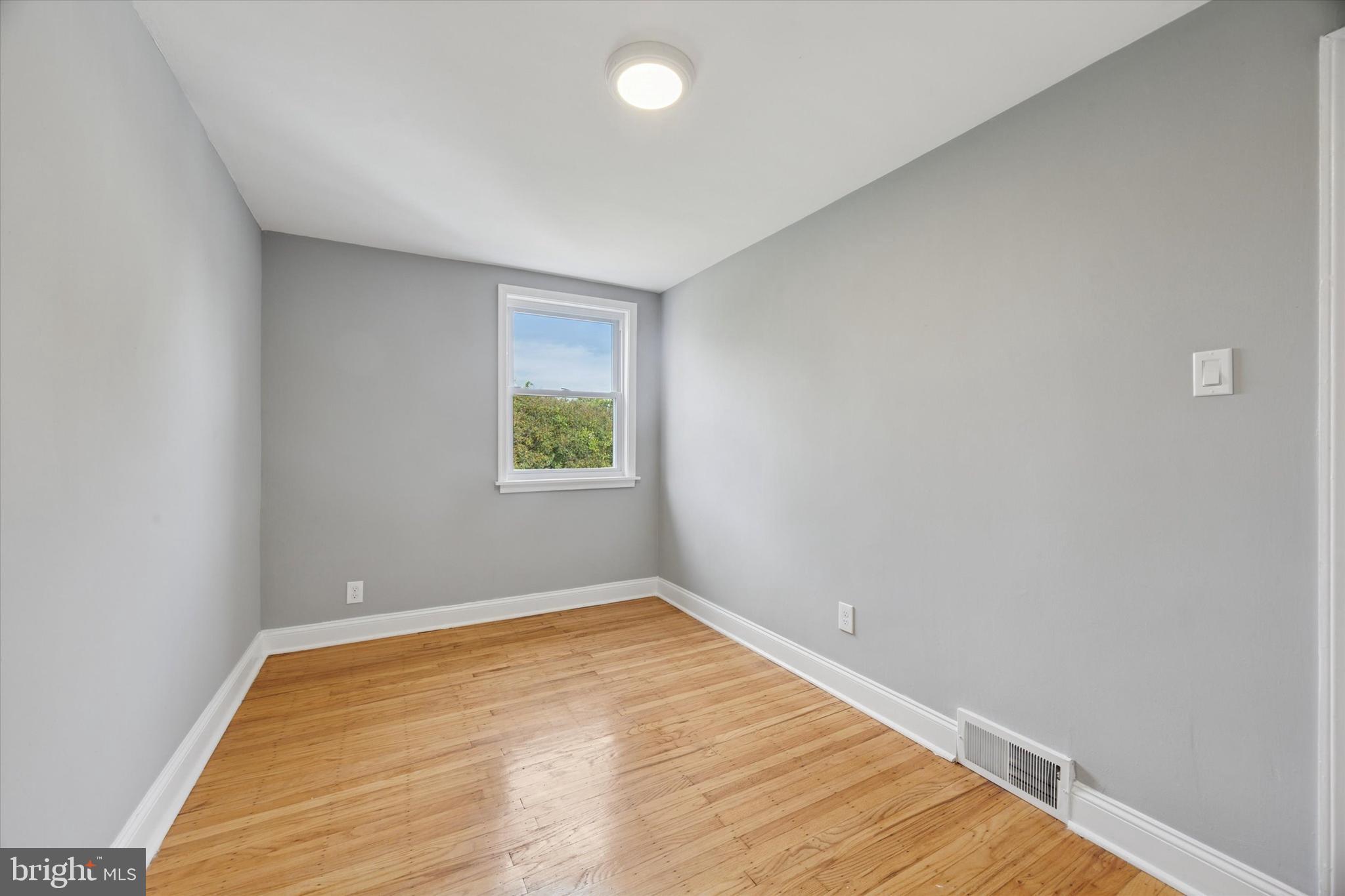 2006 Carter Road Folcroft, PA 19032 - Photo 14 of 25 a view of empty room with wooden floor